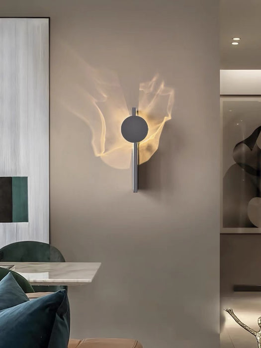 Ripple Rotating Ambient Wall Sconce